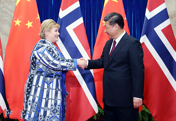 习近平会见挪威首相索尔贝格  强调为两国民众赴对方国家旅游创造更加便利条件